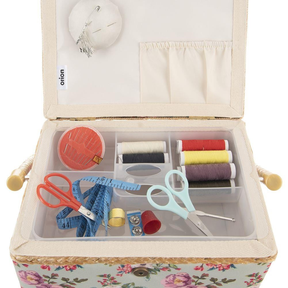 Sewing basket with compartment, floral pattern, storage of sewing accessories.