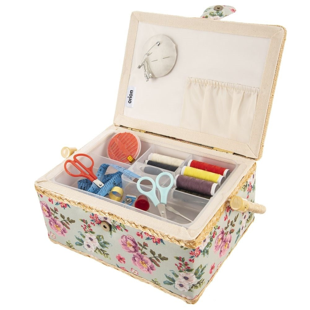 Sewing basket with compartment, floral pattern, storage of sewing accessories.