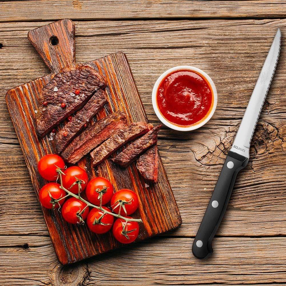 Sharp steak knives with serrated blades and robust handles