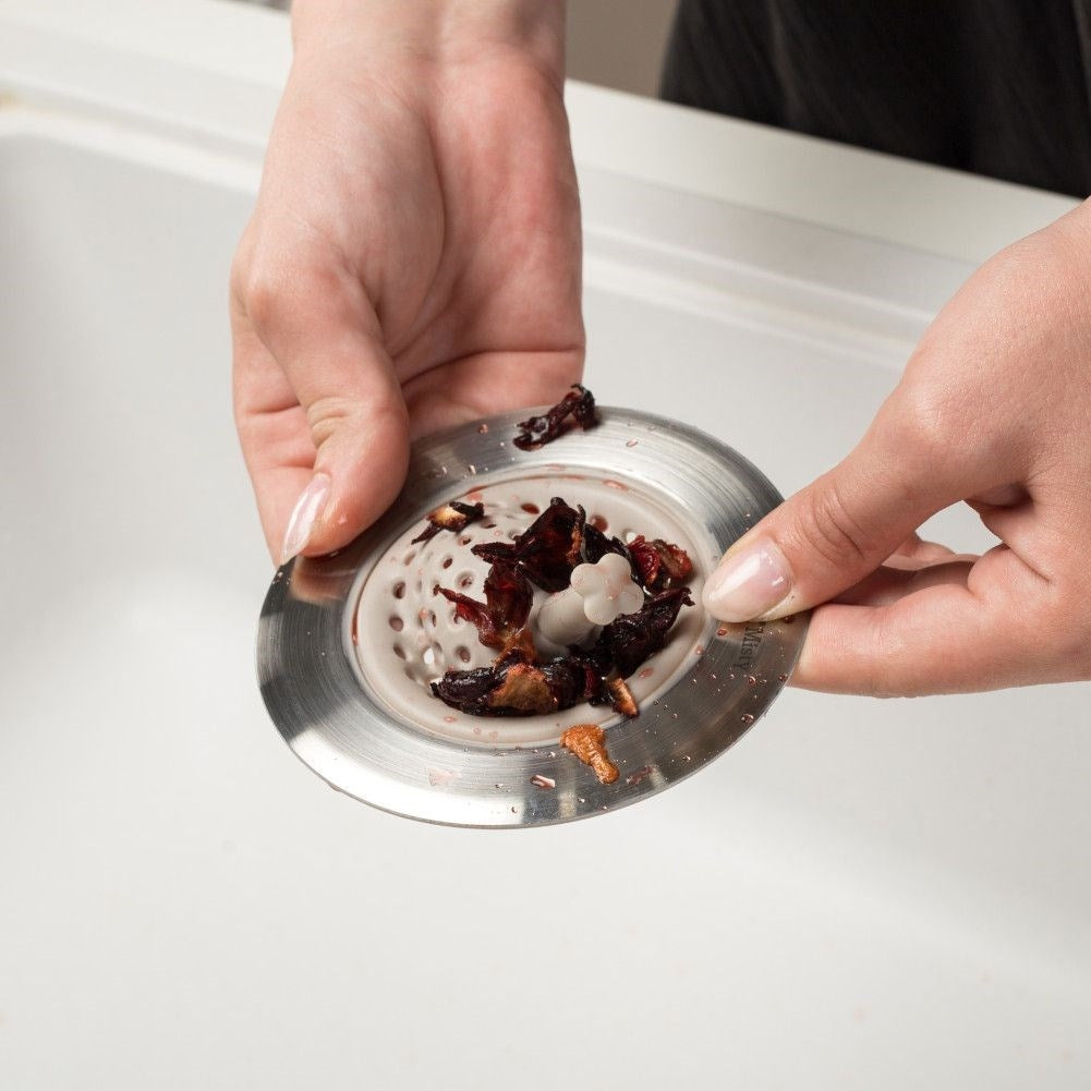 Silicone strainer for sink, stainless edge, prevents drain blockages