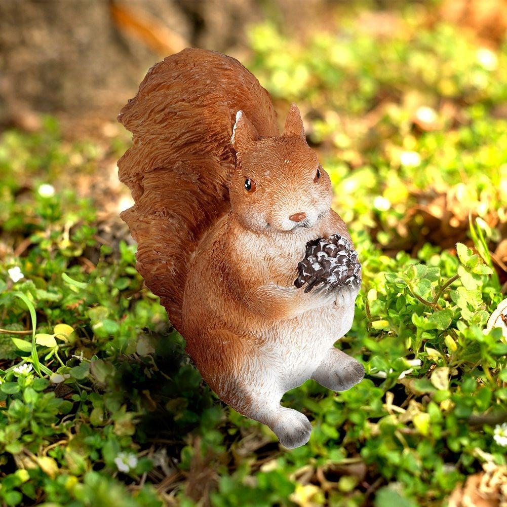 Sitting squirrel garden figure in synthetic stone