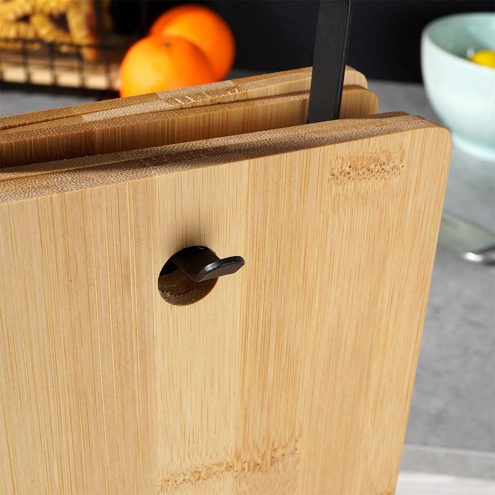 Six bamboo cutting boards on stand for cutting & serving