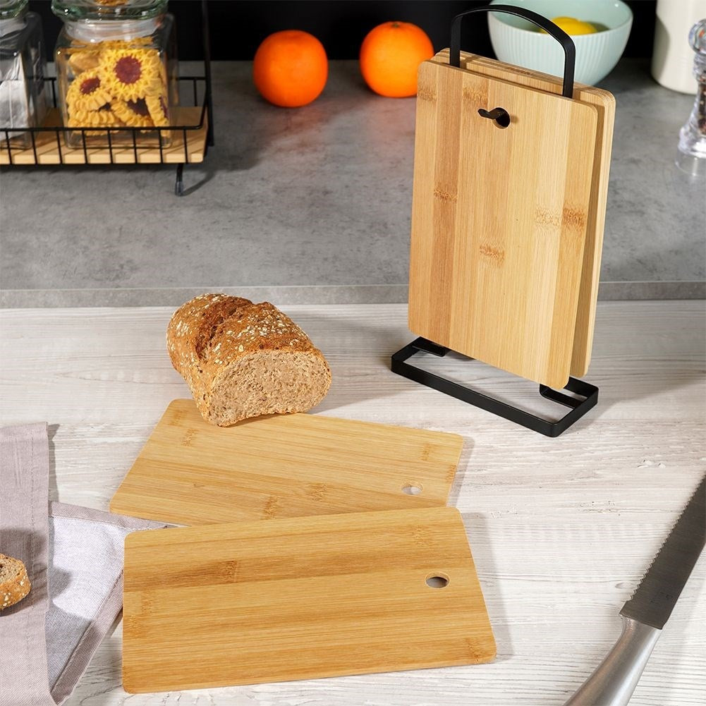 Six bamboo cutting boards on stand for cutting & serving