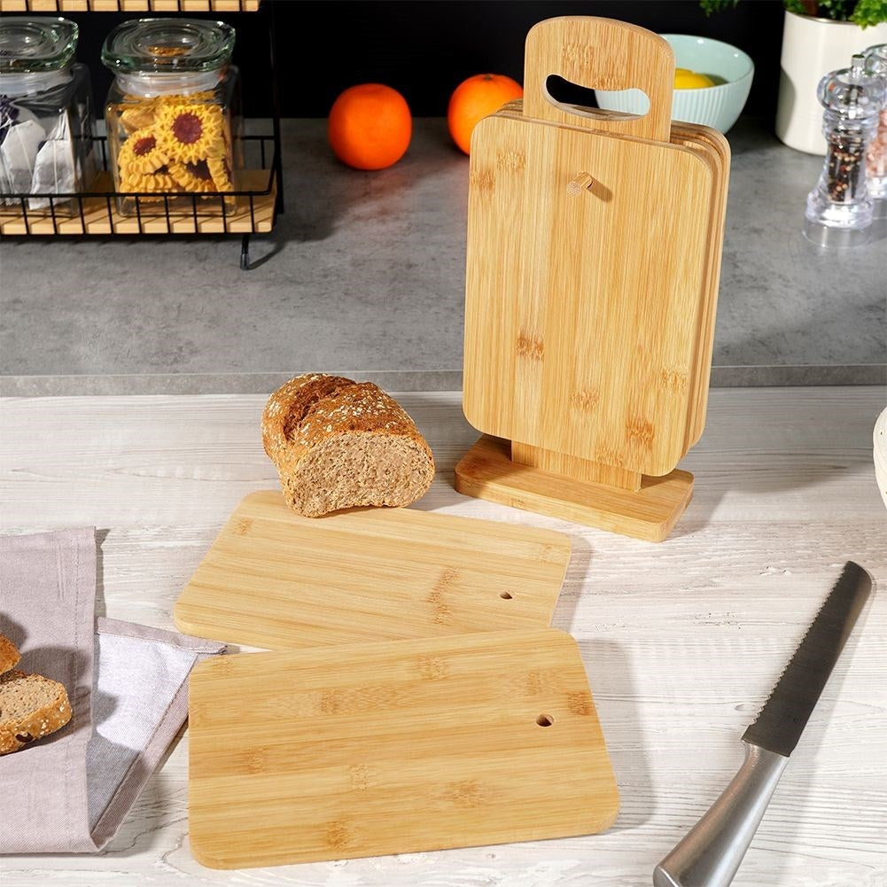Six bamboo cutting boards with stand for cutting and serving