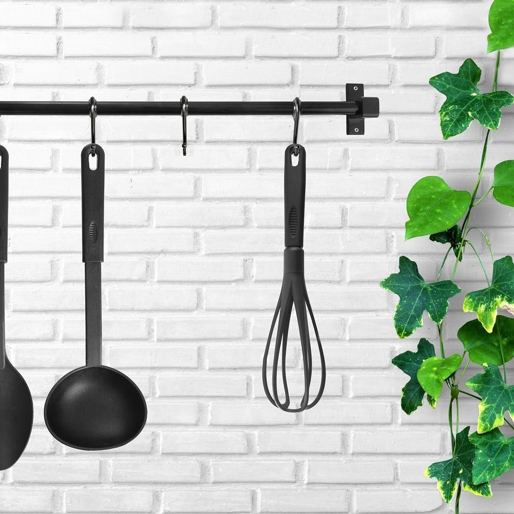Six black carpet hooks for towels and kitchen utensils