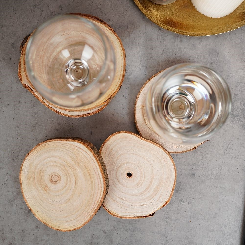 Six drink coasters in natural paulownia wood