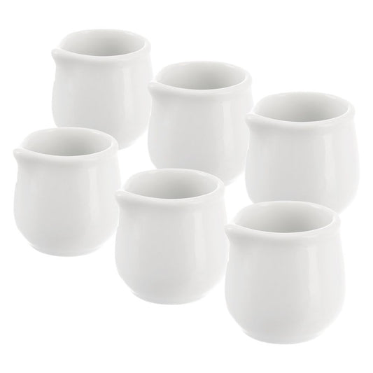 Six elegant porcelain jugs with practical spouts