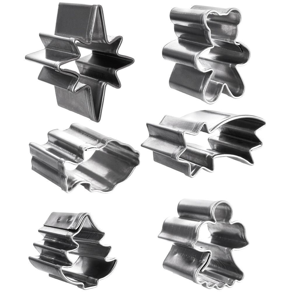 Six small cookie tins in a Christmas motif made of stainless steel