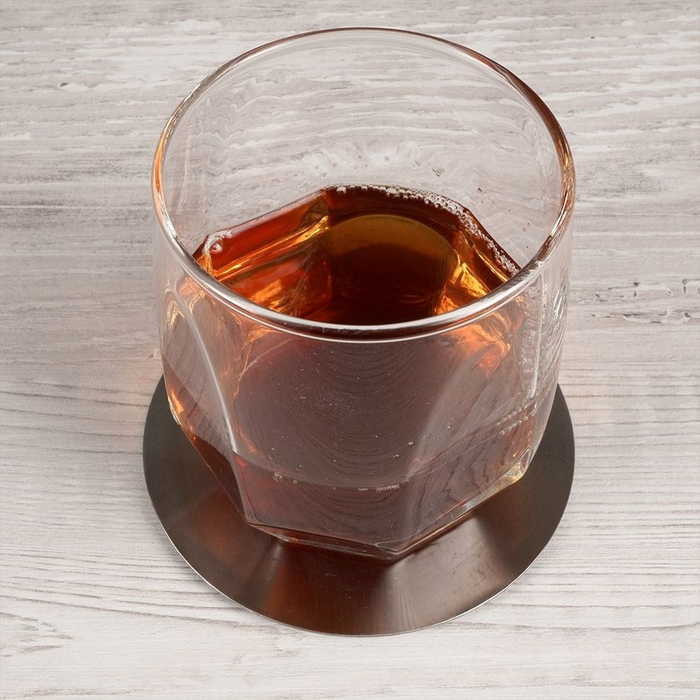 Six stainless steel coasters with protective foam