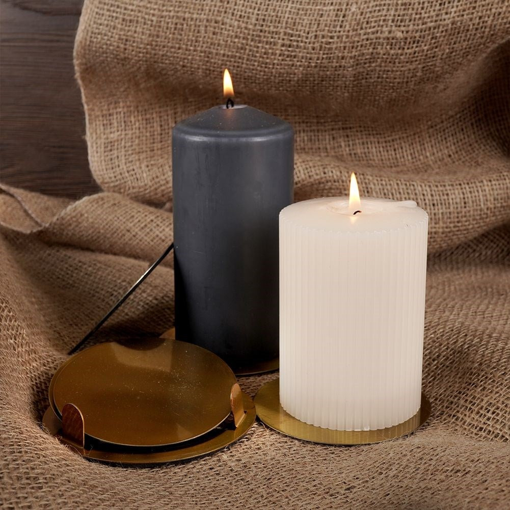 Six stylish coasters in gold-colored stainless steel with a protective layer