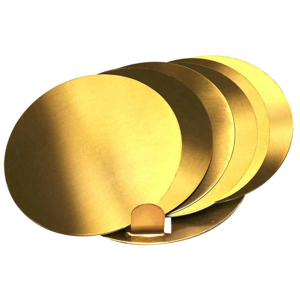 Six stylish coasters in gold-colored stainless steel with a protective layer