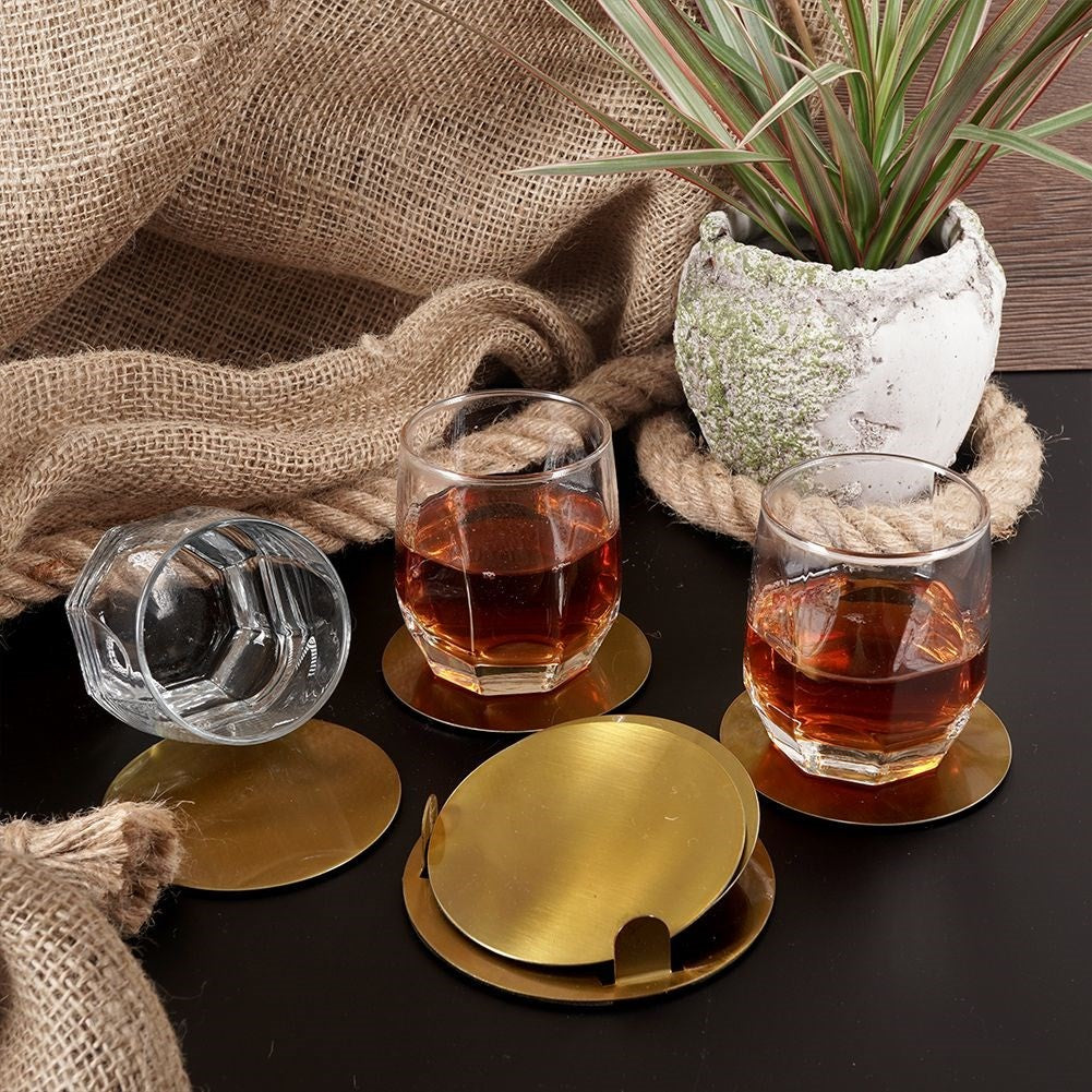 Six stylish coasters in gold-colored stainless steel with a protective layer