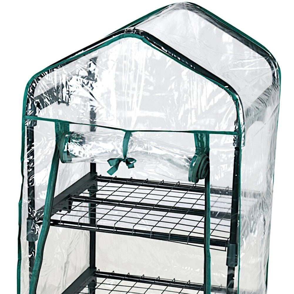 Small greenhouse for flowers, herbs and vegetables