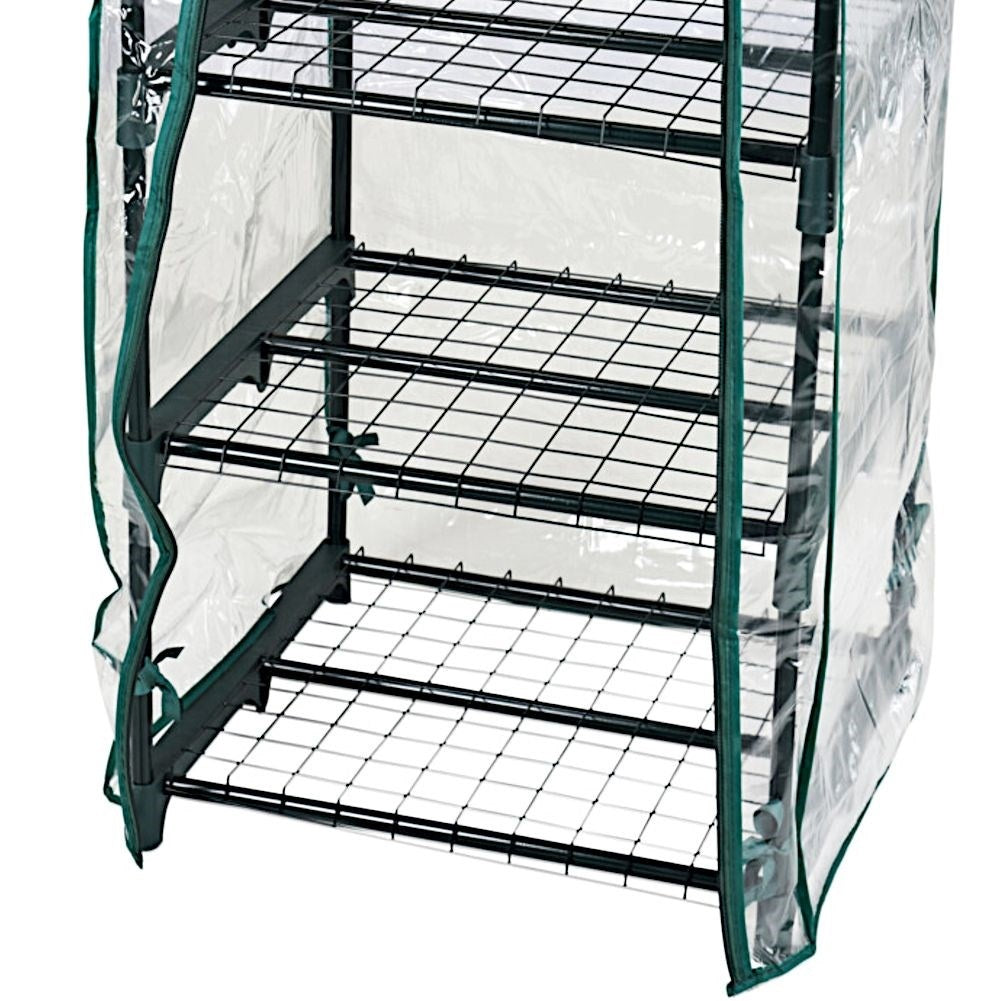 Small greenhouse for flowers, herbs and vegetables