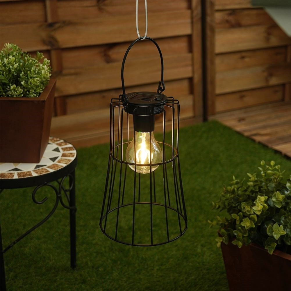 Solar powered LED lamp in black metal for the garden