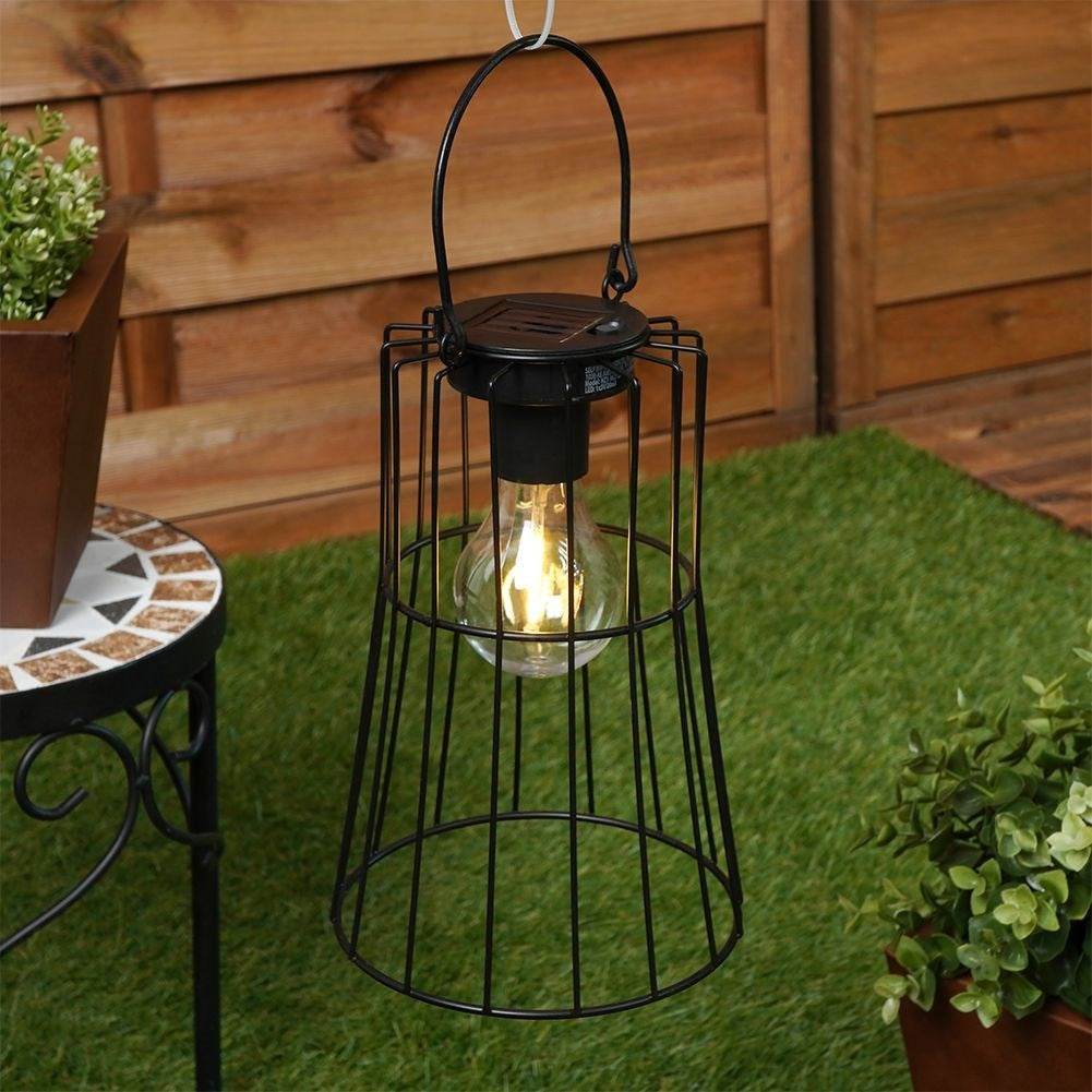 Solar powered LED lamp in black metal for the garden