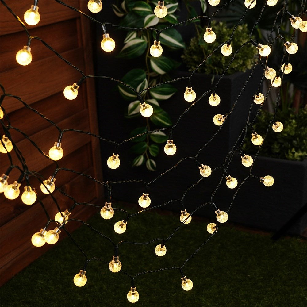 Solar powered garden garland with 100 warm LED lights