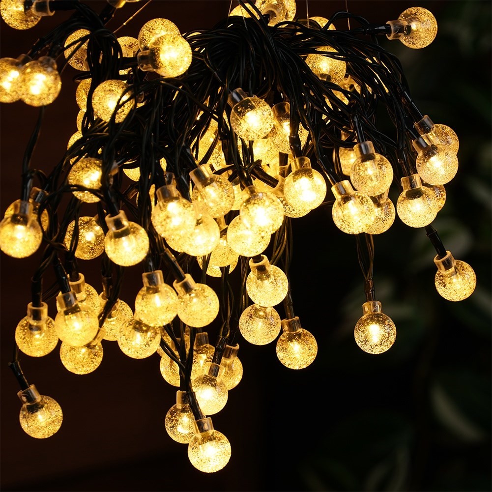 Solar powered garden garland with 100 warm LED lights