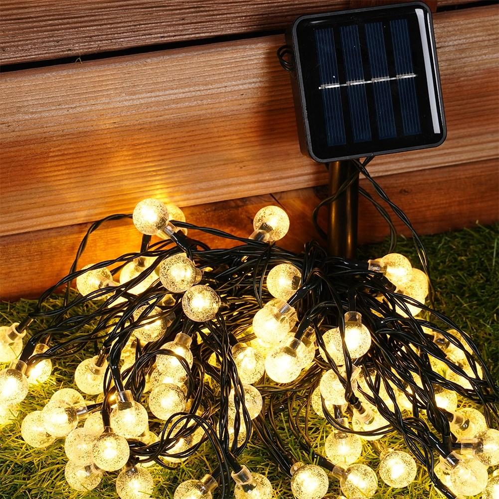 Solar powered garden garland with 100 warm LED lights