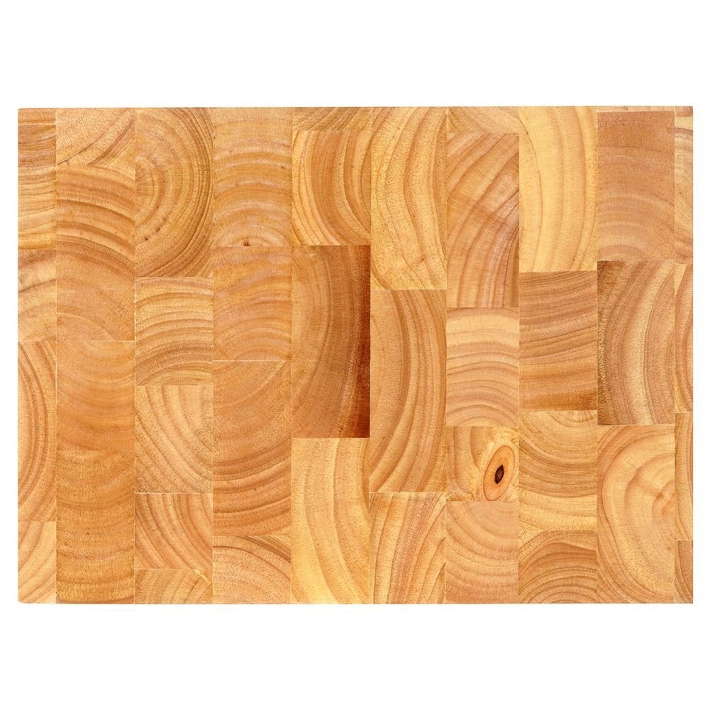 Solid wooden cutting board with recesses for easy handling