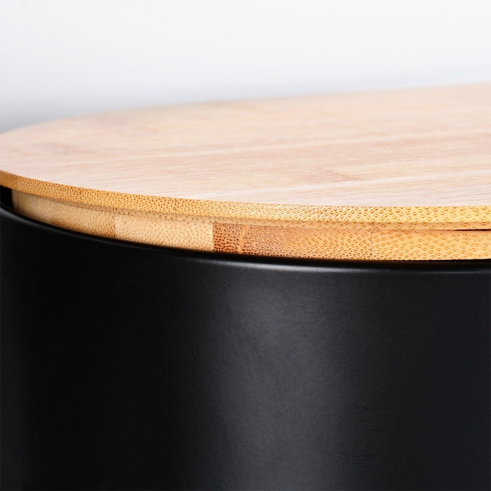 Spacious black bread box with wooden lid and cutting board