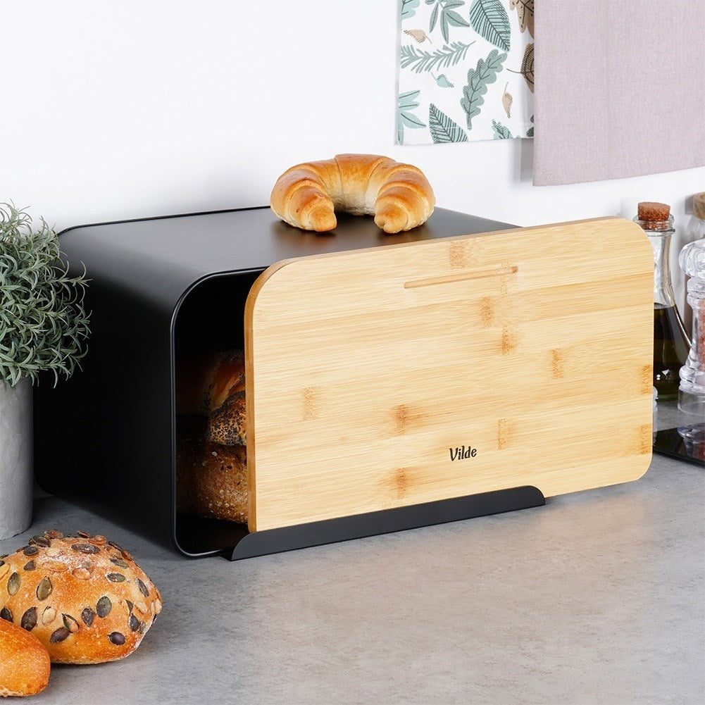 Spacious bread box in black metal with bamboo cutting board