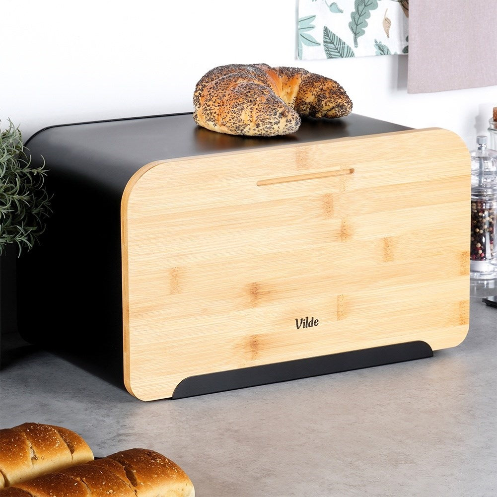 Spacious bread box in black metal with bamboo cutting board