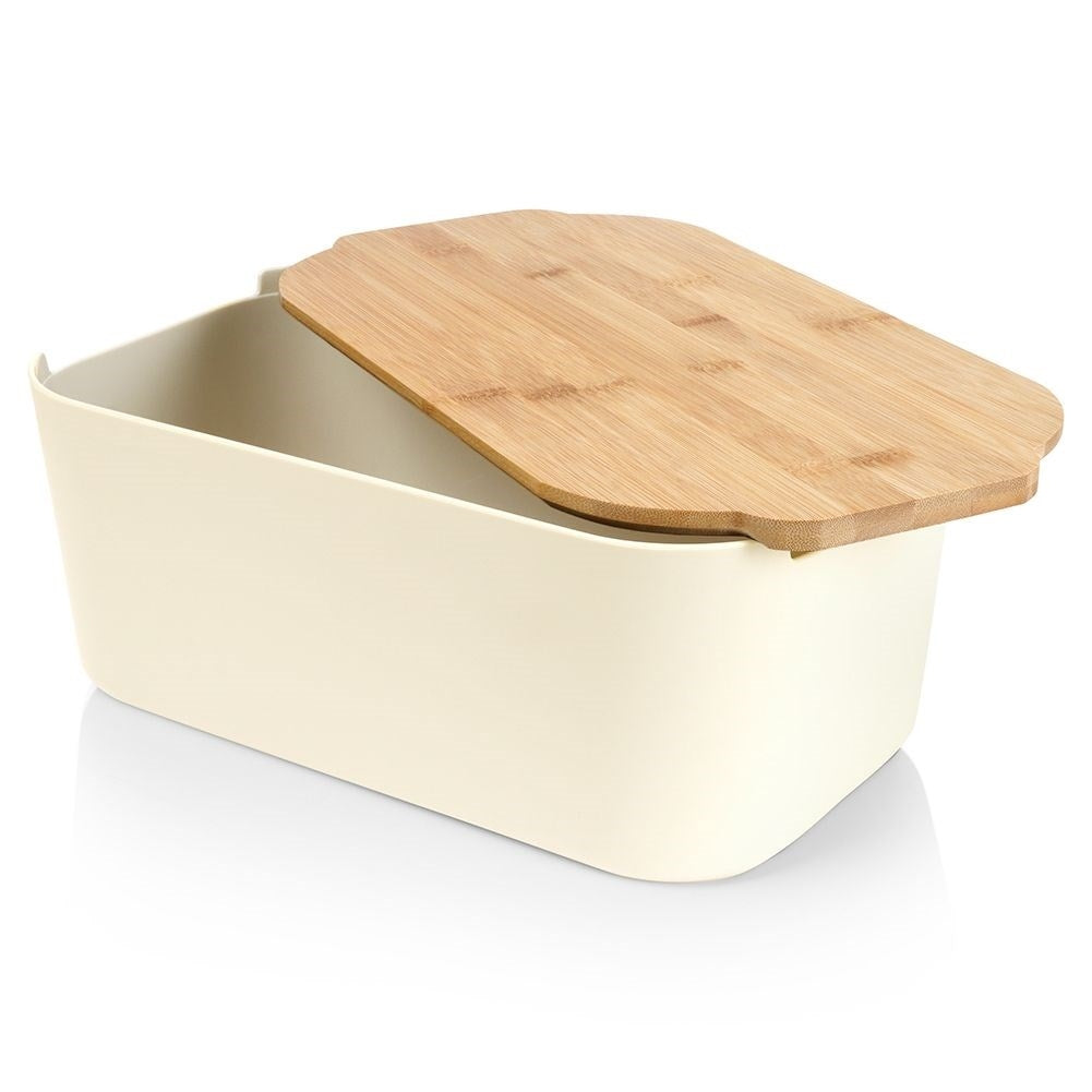 Spacious bread box in cream color with bamboo cutting board