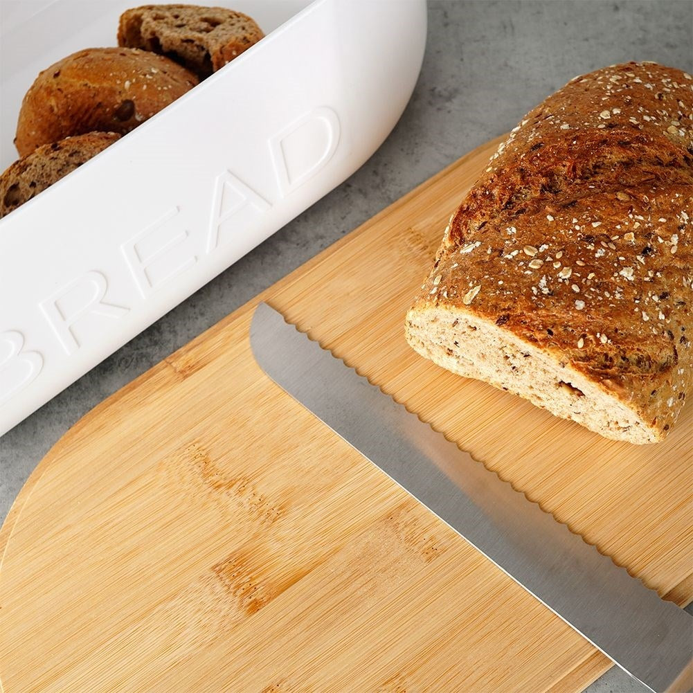 Spacious bread box in white with bamboo cutting board lid