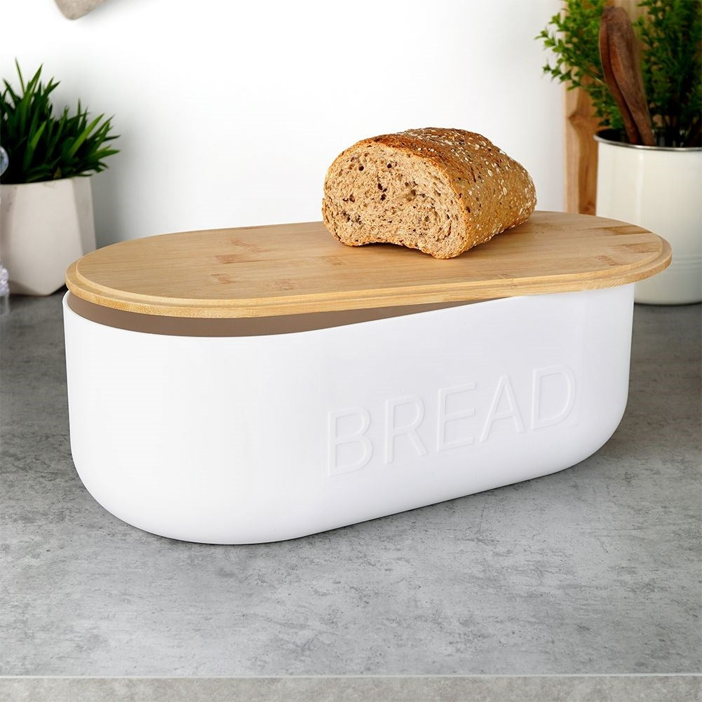 Spacious bread box in white with bamboo cutting board lid