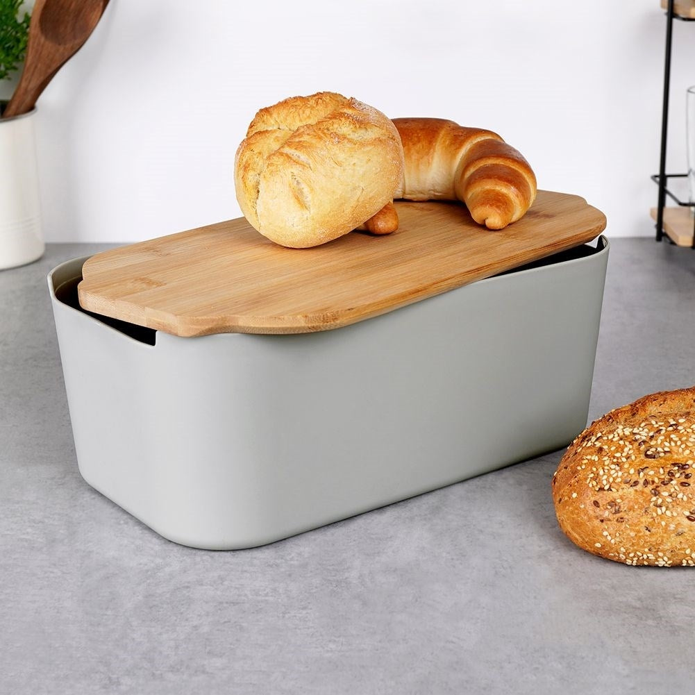 Spacious bread box with bamboo cutting board in gray material