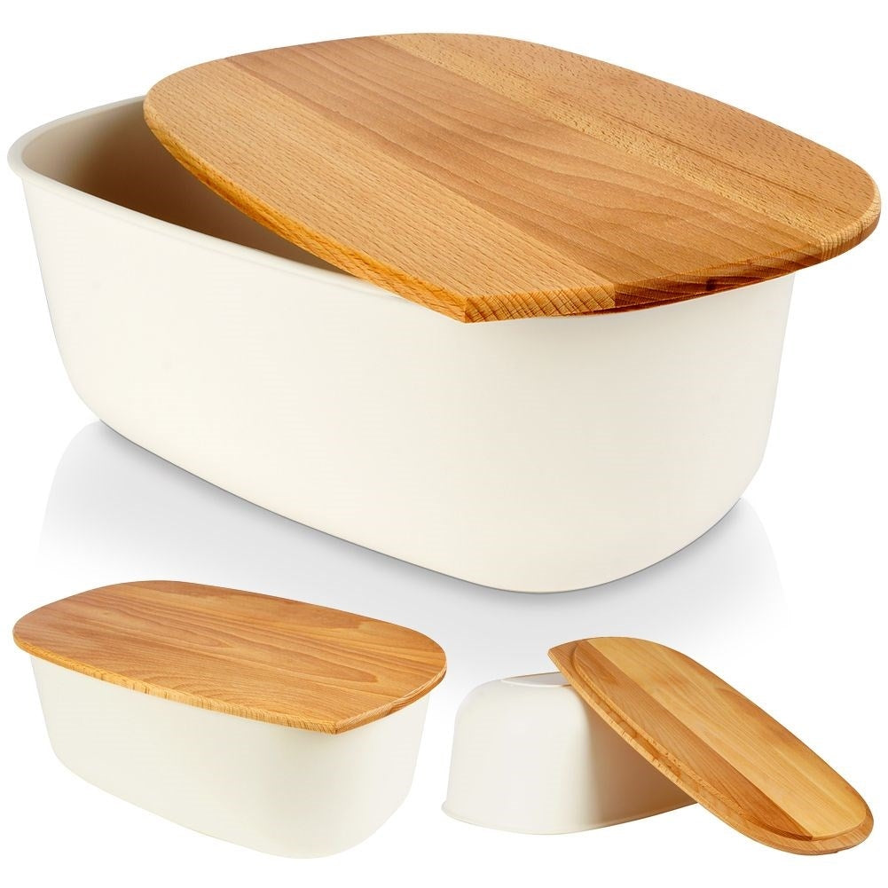 Spacious cream colored bread box with wooden cutting board