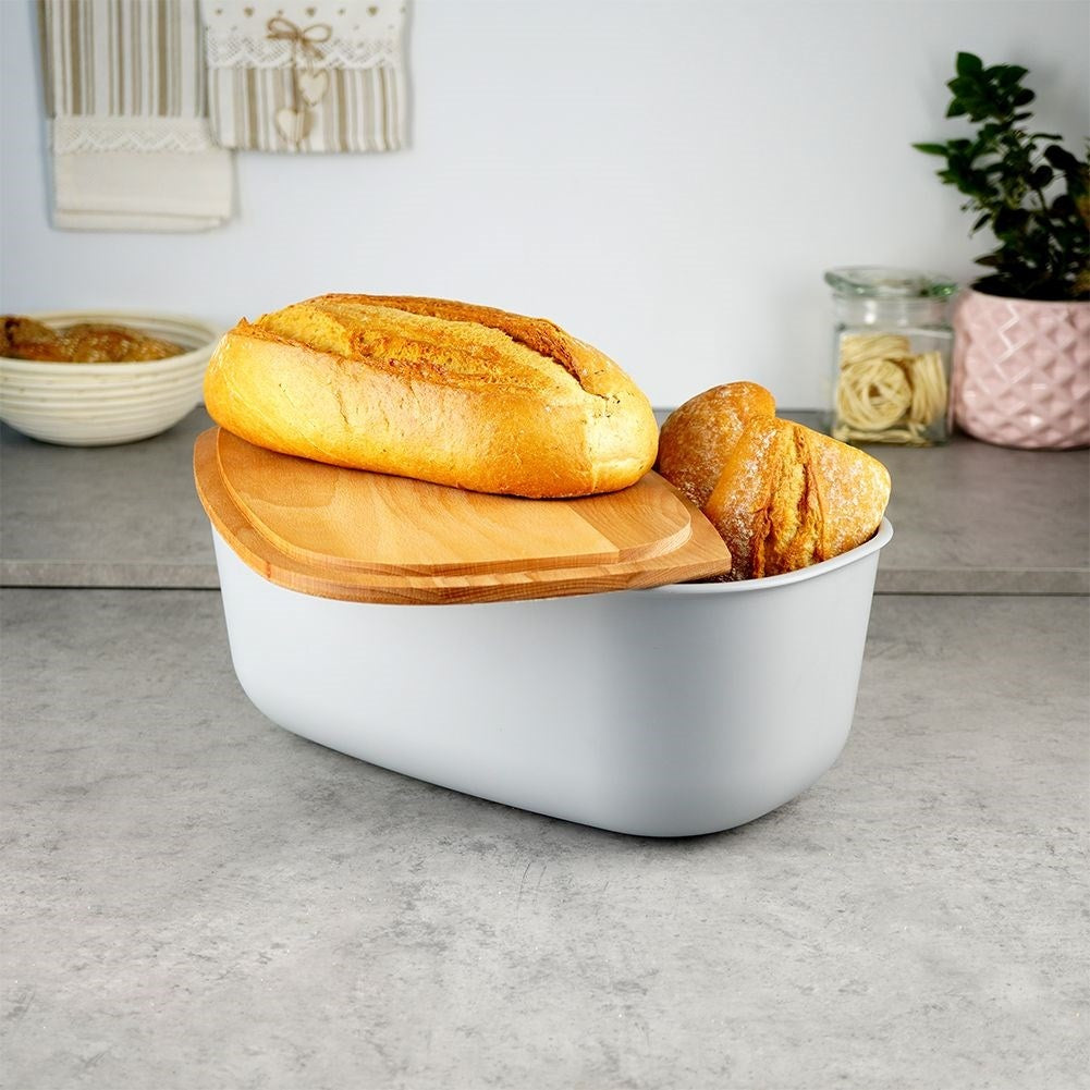 Spacious gray bread tin with a wooden cutting board as a lid