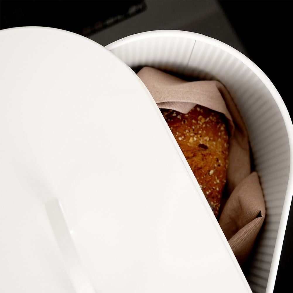 Spacious white metal bread box with lid and leather label