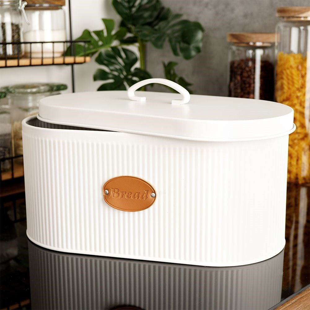 Spacious white metal bread box with lid and leather label