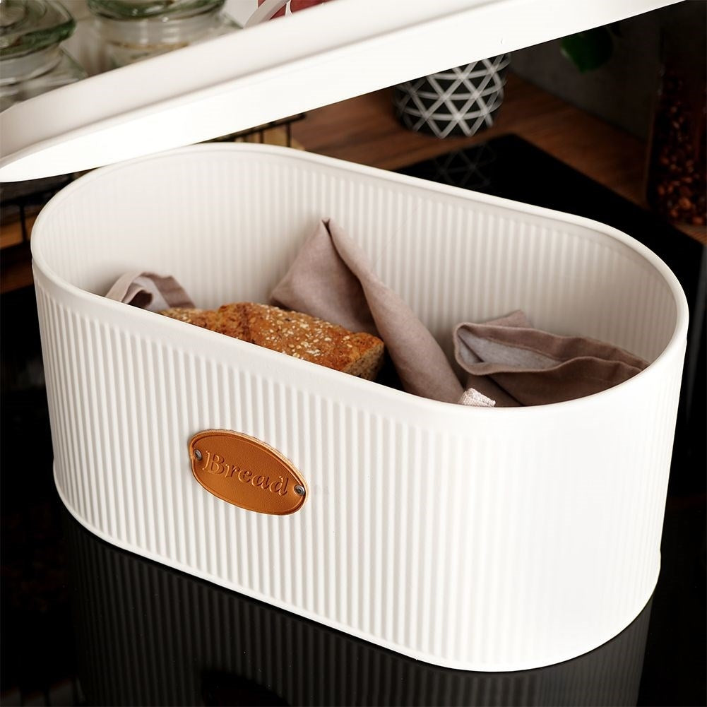 Spacious white metal bread box with lid and leather label