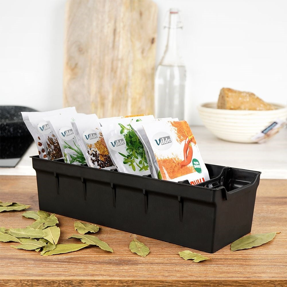 Spice bag storage: Black plastic, order in cabinets and drawers