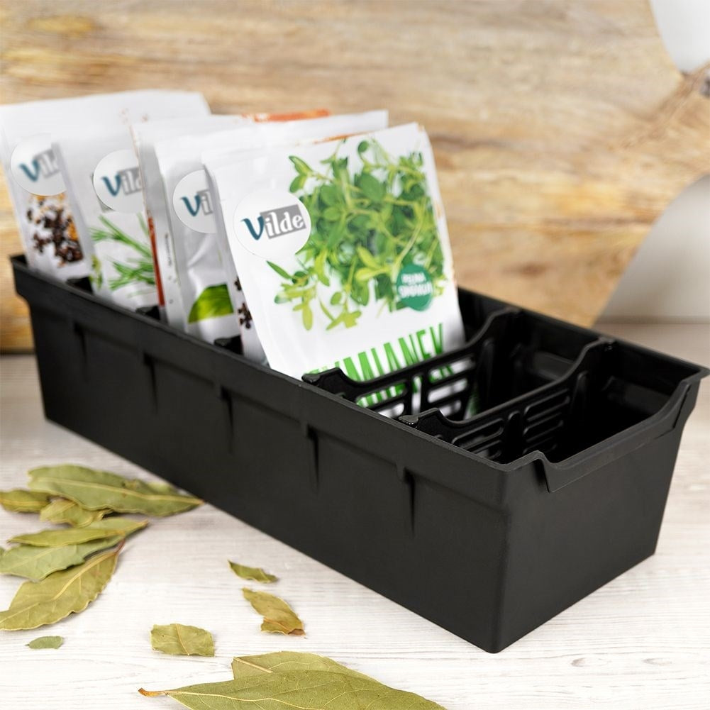Spice bag storage: Black plastic, order in cabinets and drawers