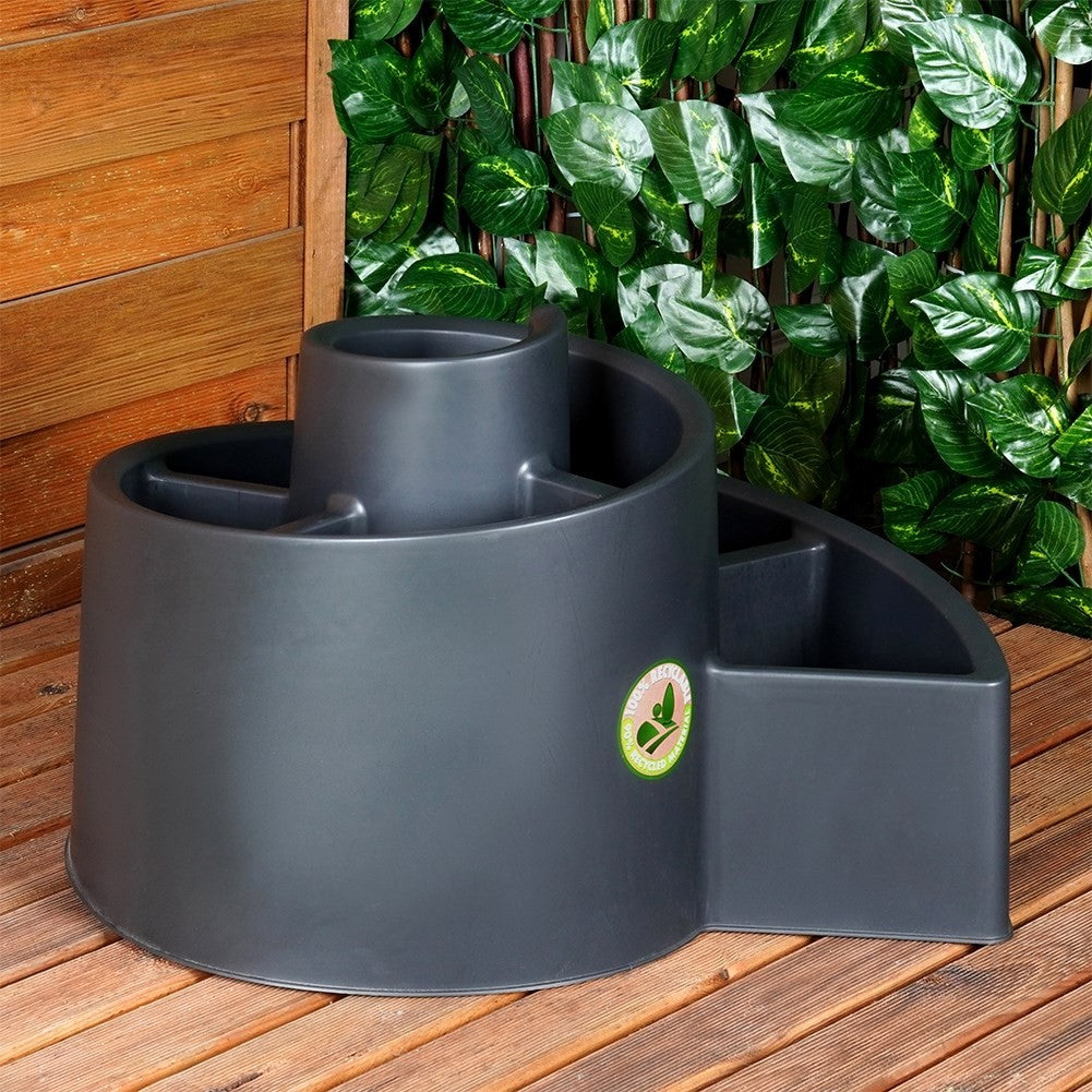 Spiral-shaped plant cascade in black plastic for garden