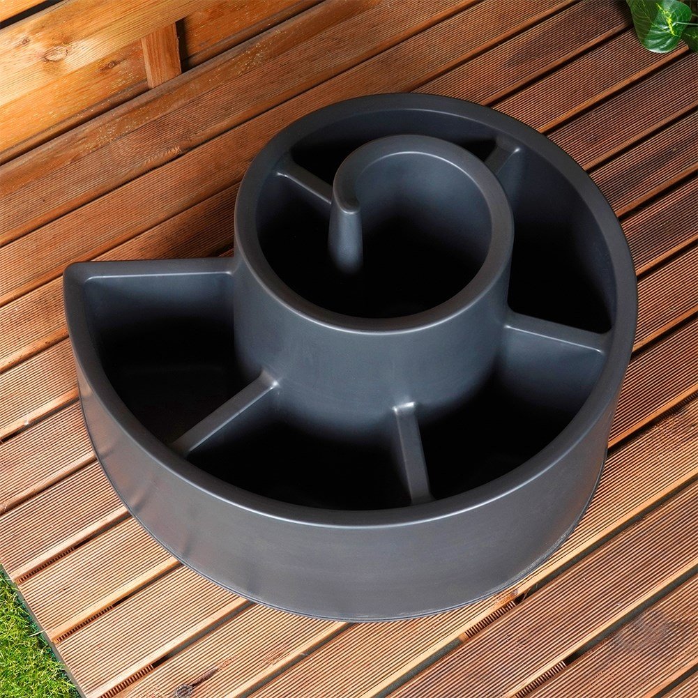 Spiral-shaped plant cascade in black plastic for garden