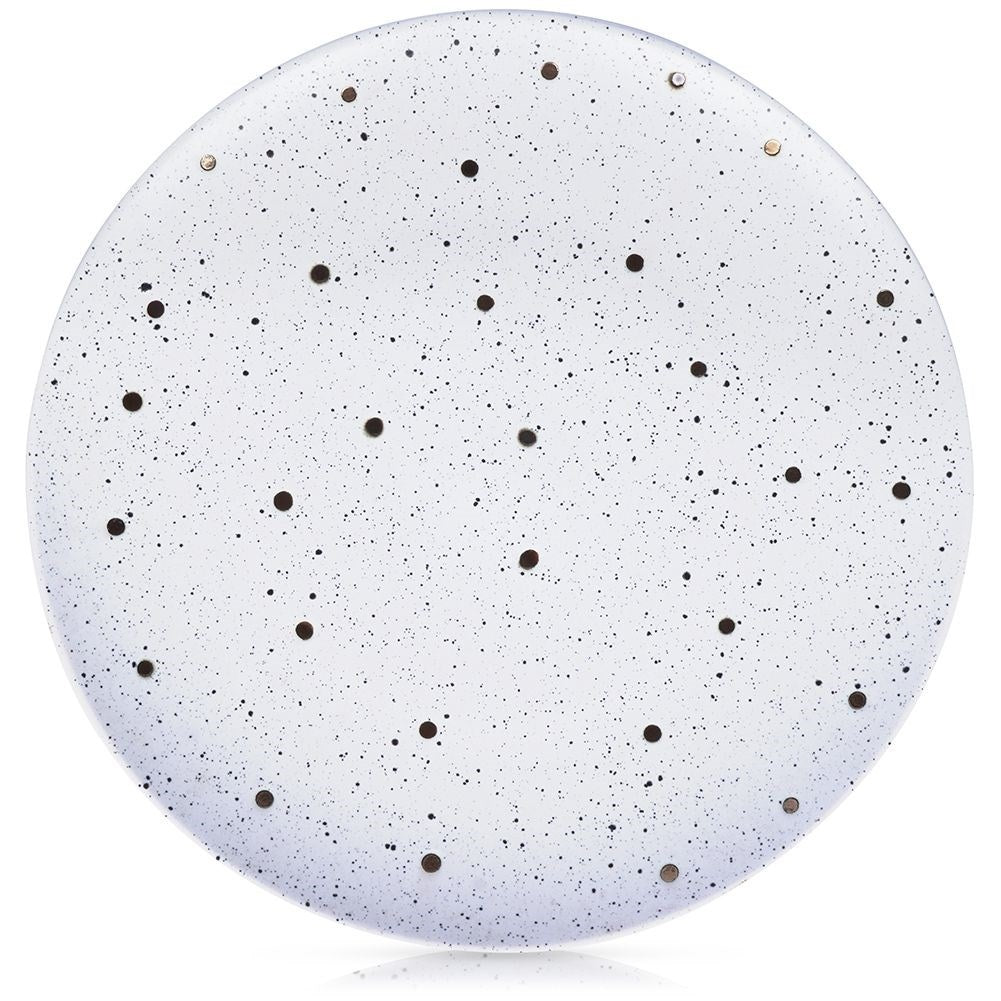 Splash-patterned matt white ceramic plate in black and gold