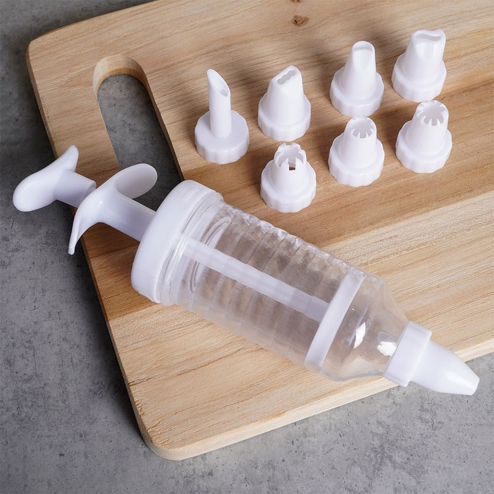 Sprayer with replaceable nozzles for decoration and filling