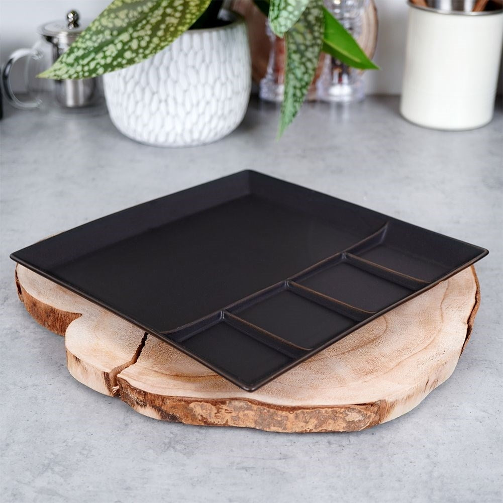 Square black porcelain tray with five sections for snacks