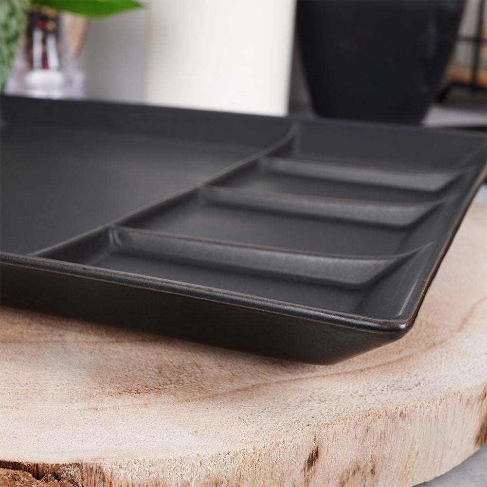 Square black porcelain tray with five sections for snacks