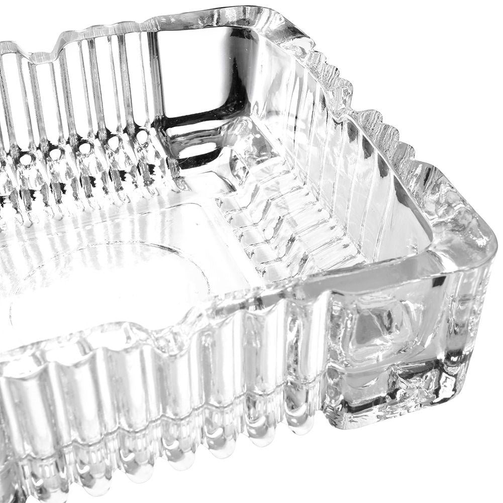 Square crystal-like glass ashtray with four cigarette sockets