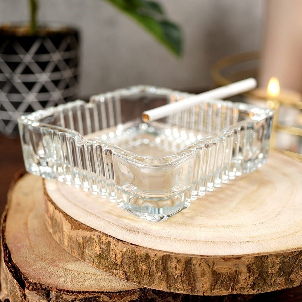 Square crystal-like glass ashtray with four cigarette sockets