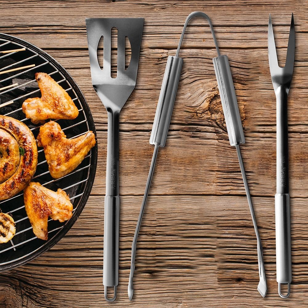 Stainless steel barbecue utensils: shovel, tongs, fork