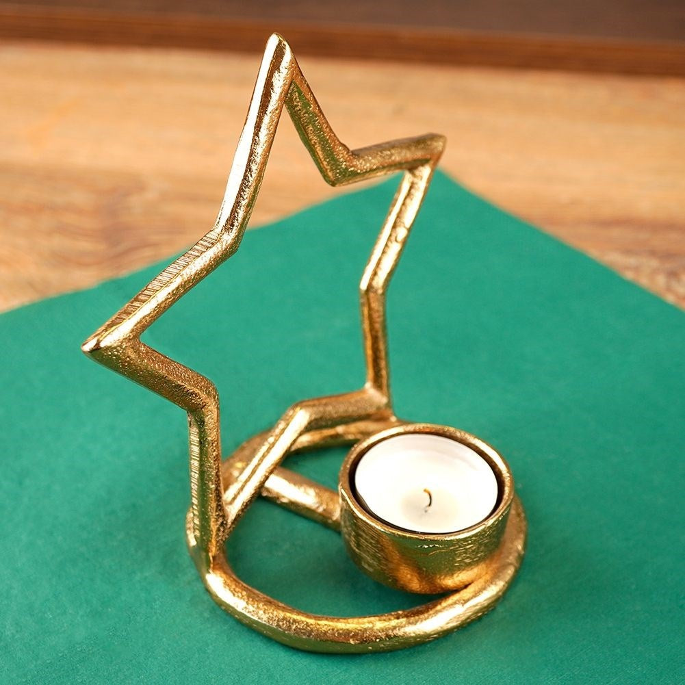 Star-shaped candle holder in aluminum for tealights