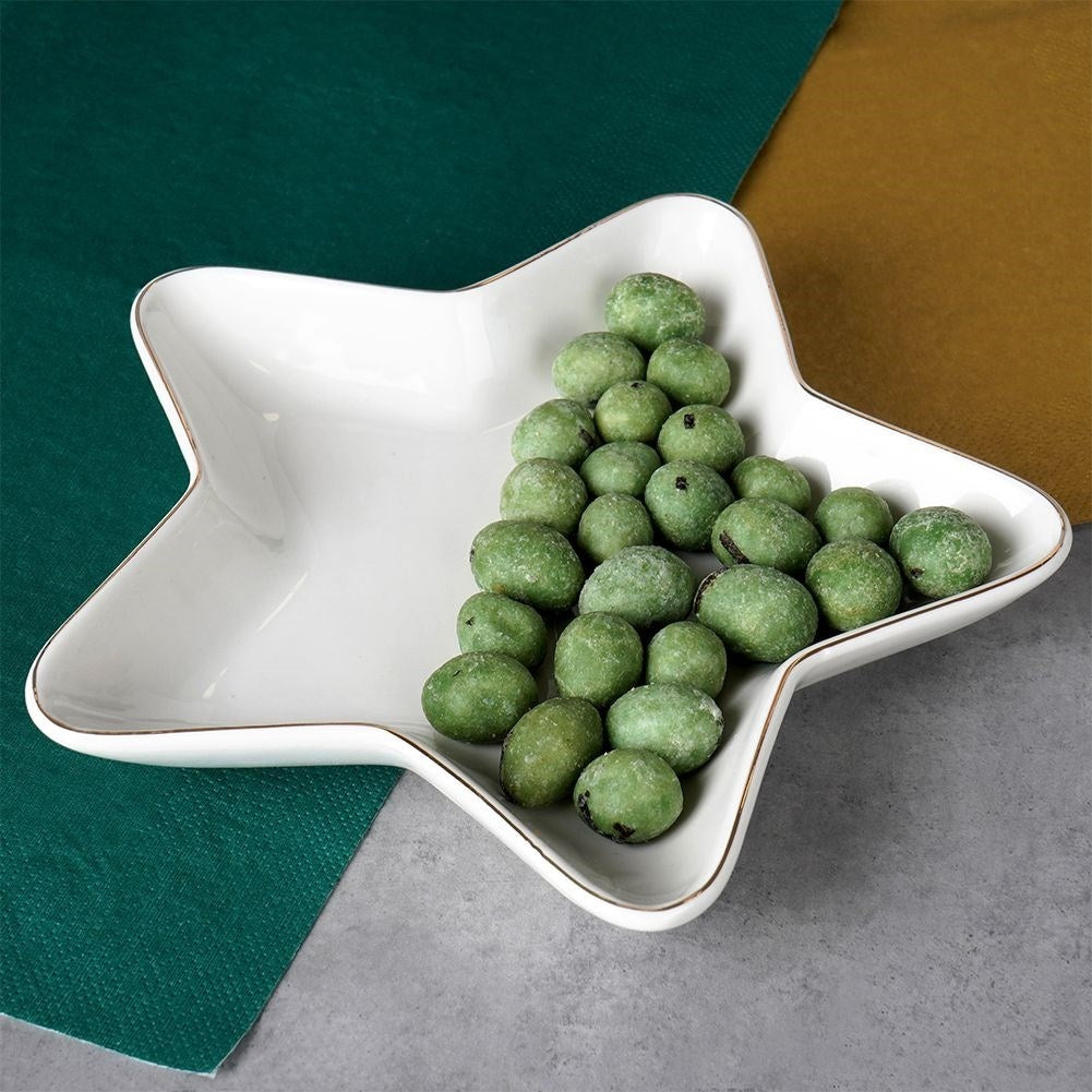 Star-shaped porcelain bowl with gold details for Christmas