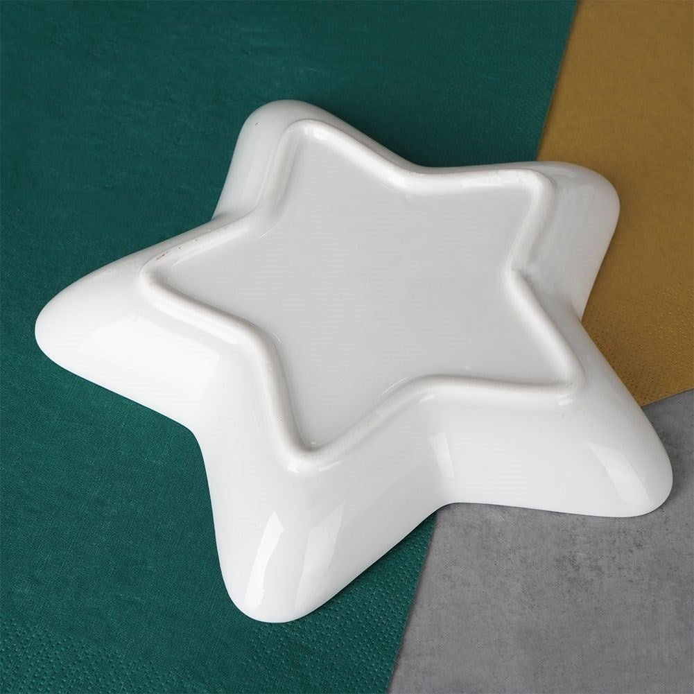 Star-shaped porcelain bowl with gold details for Christmas